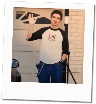 A Polaroid style photo of style blogger Dave Bowden on his first day of University