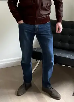 Dave Bowden modelling medium wash blue jeans