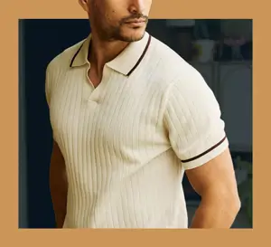 Tie-Bar-Polo Man wearing an off-white ribbed knit polo sweater shirt with dark contrast tipping from The Tie Bar.
