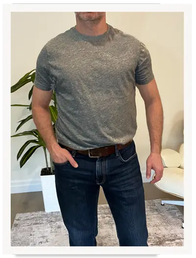 Irreverent Gent founder Dave Bowden wearing a gray cotton tee and blue jeans