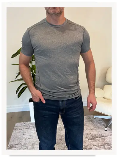 Irreverent Gent founder Dave Bowden wearing a gray synthetic tee and blue jeans
